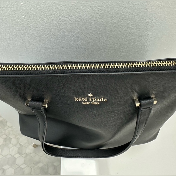 Kate Spade Black Handbag with gold hardware. Crossbody Strap included. - Picture 9 of 16